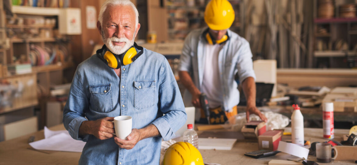 Elderly,Carpenter,With,Pleasant,Look,On,His,Face,Just,Finished